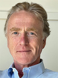 new headshot photo of NCC Group's Nigel Gibbons